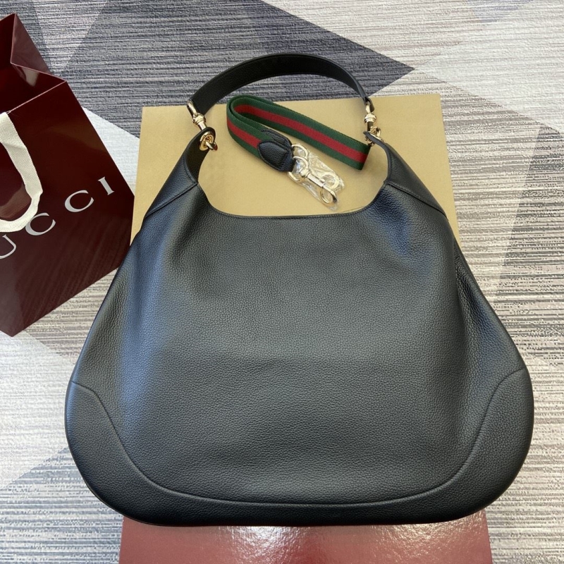 G*u*i top handle bags